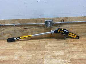 lot 29 image: DEWALT 8 in. 20V MAX Cordless Pole Saw (missing parts)