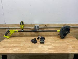lot 58 image: RYOBI ONE 18V 9 in. Lithium-Ion Cordless Battery Edger - 1.5 Ah Battery and Charger Included