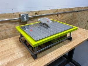 lot 76 image: RYOBI 0.75 HP 7 in. 4.8 Amp Tabletop Tile Saw