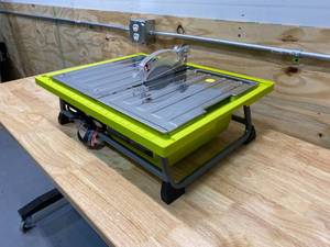 lot 78 image: RYOBI 7 in. 4.8 Amp Tile Saw