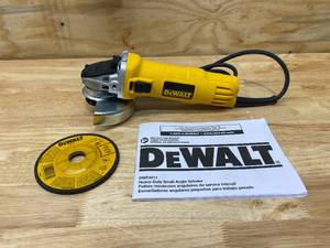 lot 99 image: DEWALT 7 Amp 4-12 in. Small Angle Grinder with 1-Touch Guard