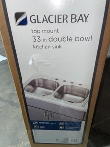 lot 51 image: GLACIER BAY DROP-IN STAINLESS STEEL 33 IN. 4-HOLE DOUBLE BOWL KITCHEN SINK. SEE PICTURES