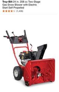 lot 79 image: TROY-BILT 24 IN. 208 CC TWO-STAGE GAS SNOW BLOWER WITH ELECTRIC START SELF PROPELLED. SEE PICTURES