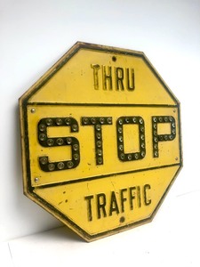 lot 6 image: Vintage Cats Eye Heavy Embossed Metal Yellow Thru Traffic Stop Sign