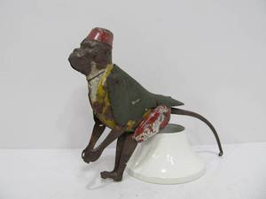 lot 94 image: Antique LEHMANN Rope Climbing Monkey Tin Toy