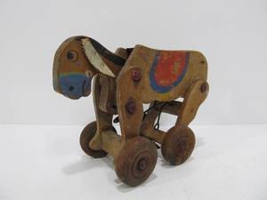 lot 95 image: Vintage 1930s Wooden Windup Kicking MuleHorse Toy