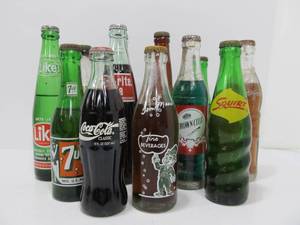 lot 133 image: Lot of Vintage Unopened Full Soda Bottles