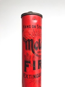 lot 251 image: Antique MOTOR Brand Automobile Fire Extinguisher Canister Tin