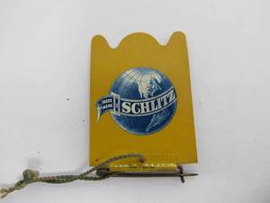 lot 143 image: Antique 1909 SCHLITZ Beer Celluloid Banner Pin