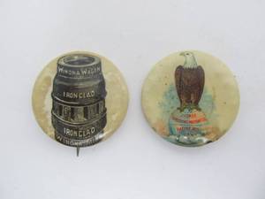 lot 146 image: 2 Antique Farm Implement Advertising Pinback Buttons - Winona Wagon & Case