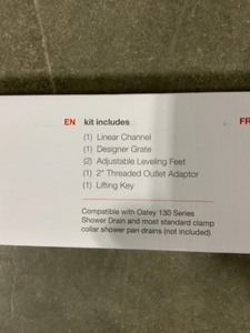 lot 15 image: OATEY DESIGNLINE 60 IN. STAINLESS STEEL LINEAR SHOWER DRAIN WITH TILE-IN PATTERN DRAIN COVER. SEE PICTURES