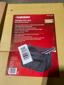 lot 63 image: HUSKY SLAT WALL AND TRACK 12 IN. UTILITY BAGS & SPEEDER BAR. SEE PICTURES