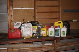 lot 377 image: Antifreeze, oil, gas cans