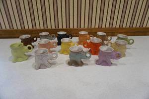 lot 59 image: Elephant mugs