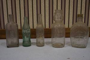 lot 128 image: Glass bottles