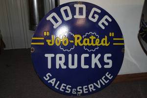 lot 39 image: Dodge Job Rated Trucks Metal Sign - Believed Reproduction