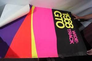 lot 101 image: 1968 Pontiac GTOBonnevilleLe MansExecutive Wide Track Dealership Posters - Black Light