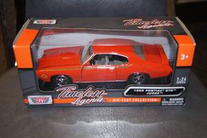 lot 120 image: Motor Max Timeless Legends 124 Scale 1969 GTO Judge Die-Cast Car