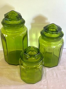 lot 6 image: Three Piece Vintage Green Canister Set