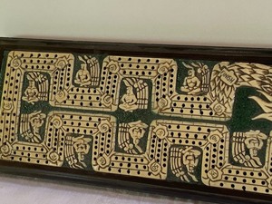lot 15 image: Aztec Designed Cribbage Board