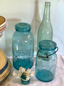 lot 35 image: Vintage Pottery Bowls and Blue Ball Jars