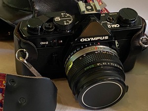 lot 40 image: Olympus 33mm Camera and Telephoto Lens