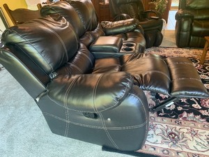 lot 13 image: Coordinating Reclining Leather Sofa and Love Seat