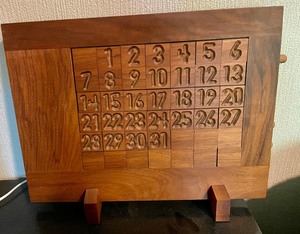 lot 275 image: Wooden Calendar