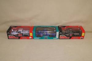 lot 107 image: 3 NASCAR Truck Series Die Cast Trucks - 124 Scale