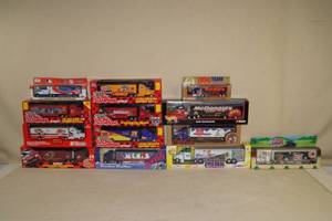 lot 109 image: Race Team Haulers - NFL, Coke, MLB, WCW, Cartoon Network