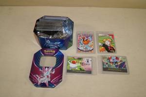 lot 95 image: Metal Tin of Pokemon Cards and Game Accessories
