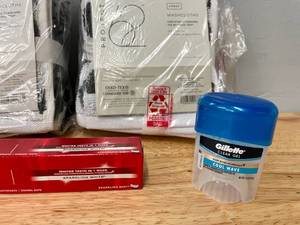 lot 150 image: Lot of Bathroom Items-Washcloths Deodorant and Toothpaste