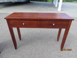 lot 210 image: Wood table and matching vertical case