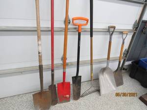 lot 198 image: Seven shovels and a rake