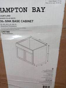 Courtland Shaker Assembled 30 in. x 34.5 in. x 24 in. Stock Sink Base Kitchen Cabinet in Polar White Finish by Hampton Bay- open box not used - see pictures