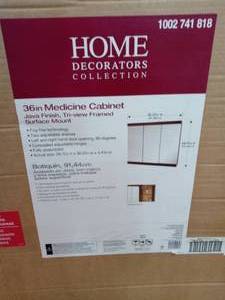 36-14 in. W x 29-34 in. H Fog Free Framed Surface-Mount Tri-view Bathroom Medicine Cabinet in Java by Home Decorators Collection- damaged- see pictures