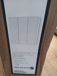 30-38 in. W x 30-316 in. H Frameless Surface-Mount Tri-View Bathroom Medicine Cabinet by Glacier Bay- open box not used -see pictures