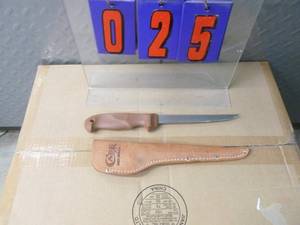 lot 25 image: Case filet knife with leather sheath. As shown