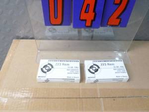 lot 42 image: 2 boxes of 223 ammo. As shown.