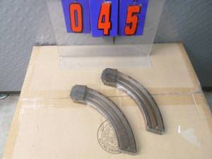 lot 45 image: 2 Ruger 10-22 clips. Approx 25 rounds As shown.