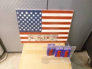 lot 56 image: American pride plaque. As shown.