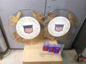 lot 57 image: 2 Coast Guard wall hangers. As shown.