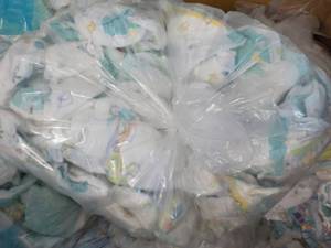 Bag of 100 or so Diapers newborn - ...