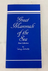 lot 128 image: Wyland Collectible Plate and Signed Book