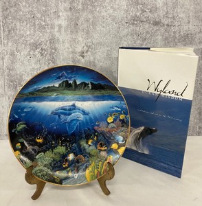lot 129 image: Collectible Plate by Robert Lyn Nelson & Signed Book by Wyland