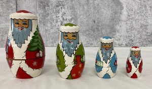 lot 139 image: Russian Stacking Santas & Jeweled Star Ornament