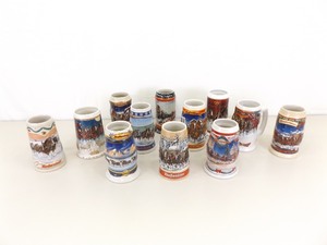 lot 4 image: 12 Collectible Budweiser Beer Steins