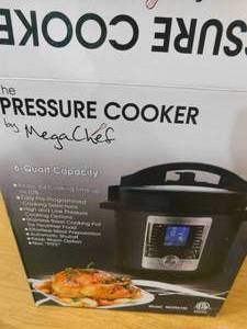 lot 40 image: MegaChef 6-Qt. Stainless Steel Electric Digital Pressure Cooker