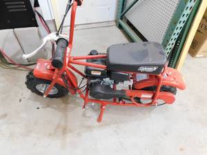 lot 62 image: NEW - Coleman CT100U Gas Mini Bike  Red