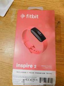 lot 63 image: Fitbit Inspire 2 Fitness Tracker with Heart Rate and Premium Trial  Desert Rose